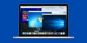 Front view of a Macbook displaying multiple versions of Windows operating systems through virtualization or emulation software.
